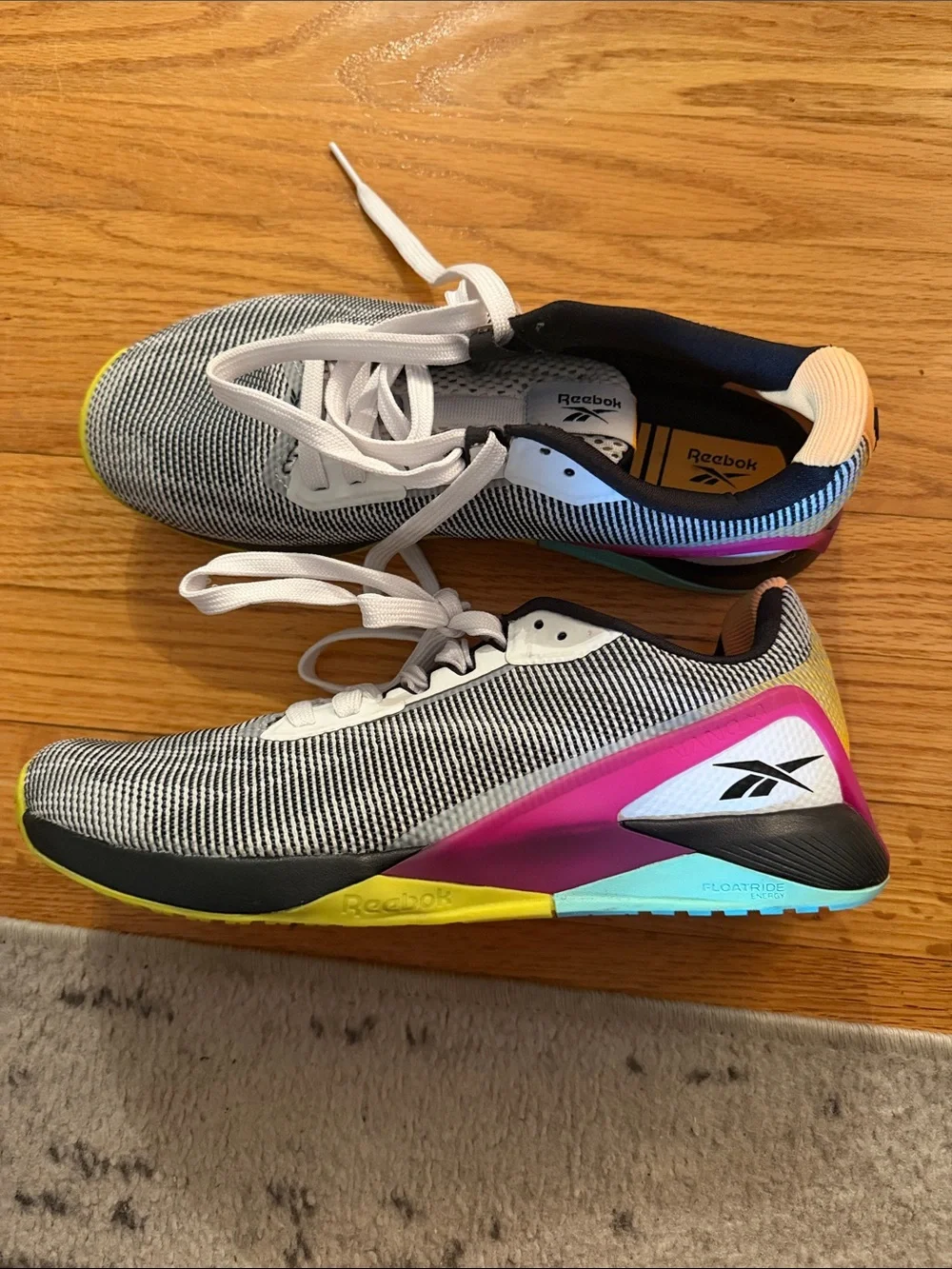 Reebok Men's Black & White Running Shoes with Pink and Yellow Accents